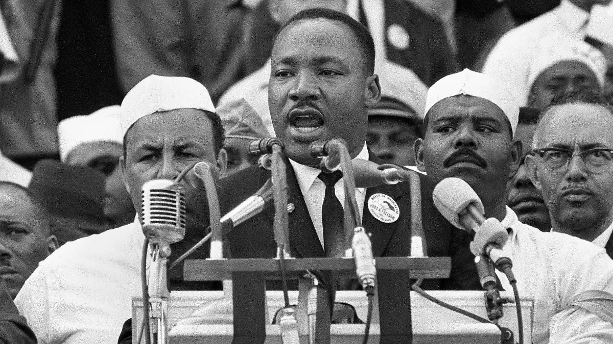 FILE - In this Aug. 28, 1963 file photo, Dr. Martin Luther King Jr., head of the Southern Christian Leadership Conference, addresses marchers during his "I Have a Dream" speech at the Lincoln Memorial in Washington. The annual celebration of the Martin Luther King Jr. holiday in his hometown in Atlanta is calling for renewed dedication to nonviolence following a turbulent year. The slain civil rights leader's daughter, the Rev. Bernice King, said in an online church service Monday, Jan. 18, 2021, that physical violence and hateful speech are “out of control” in the aftermath of a divisive election followed by a deadly siege on the U.S. Capitol in Washington by supporters of President Donald Trump. (AP Photo/File)
