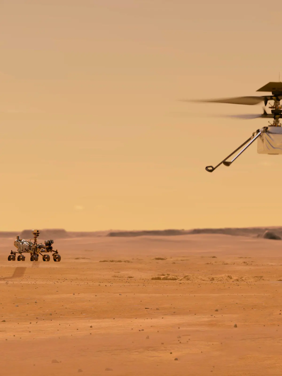 This illustration made available by NASA depicts the Ingenuity helicopter on Mars after launching from the Perseverance rover, background left. It will be the first aircraft to attempt controlled flight on another planet. (NASA/JPL-Caltech via AP)