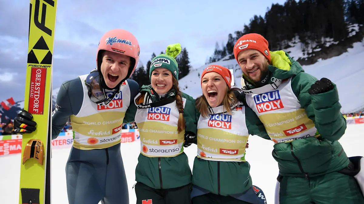 SEEFELD, AUSTRIA - MARCH 02: Karl Geiger of Germany, Katharina Althaus of Germany, Markus Eisenbichler of Germany and Juliane Seyfarth of Germany celebrates following their victory in the Mixed Team Ski Jumping HS109 competition during the FIS Nordic World Ski Championships on March 2, 2019 in Seefeld, Austria. (Photo by Matthias Hangst/Getty Images)