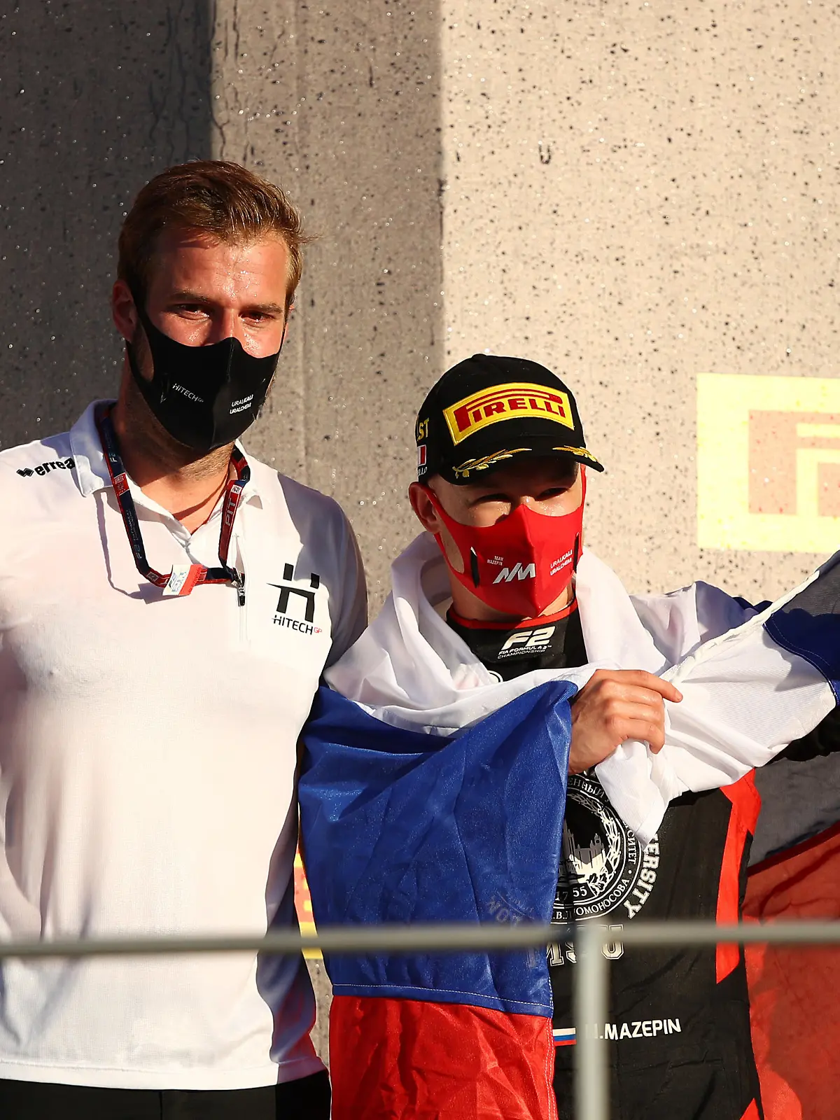 SCARPERIA, ITALY - SEPTEMBER 12: Race winner Nikita Mazepin of Russia and Hitech Grand Prix and Hitech Grand Prix race engineer Jan Sumann celebrate on the podium during the Formula 2 Championship Feature Race at Mugello Circuit on September 12, 2020 in Scarperia, Italy. (Photo by Bryn Lennon/Getty Images)