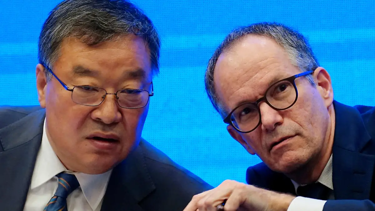 Peter Ben Embarek, a member of the World Health Organization (WHO) team tasked with investigating the origins of the coronavirus disease (COVID-19), and Liang Wannian, head of expert panel on COVID-19 response at China's National Health Commission, attend the WHO-China joint study news conference at a hotel in Wuhan, Hubei province, China February 9, 2021. REUTERS/Aly Song