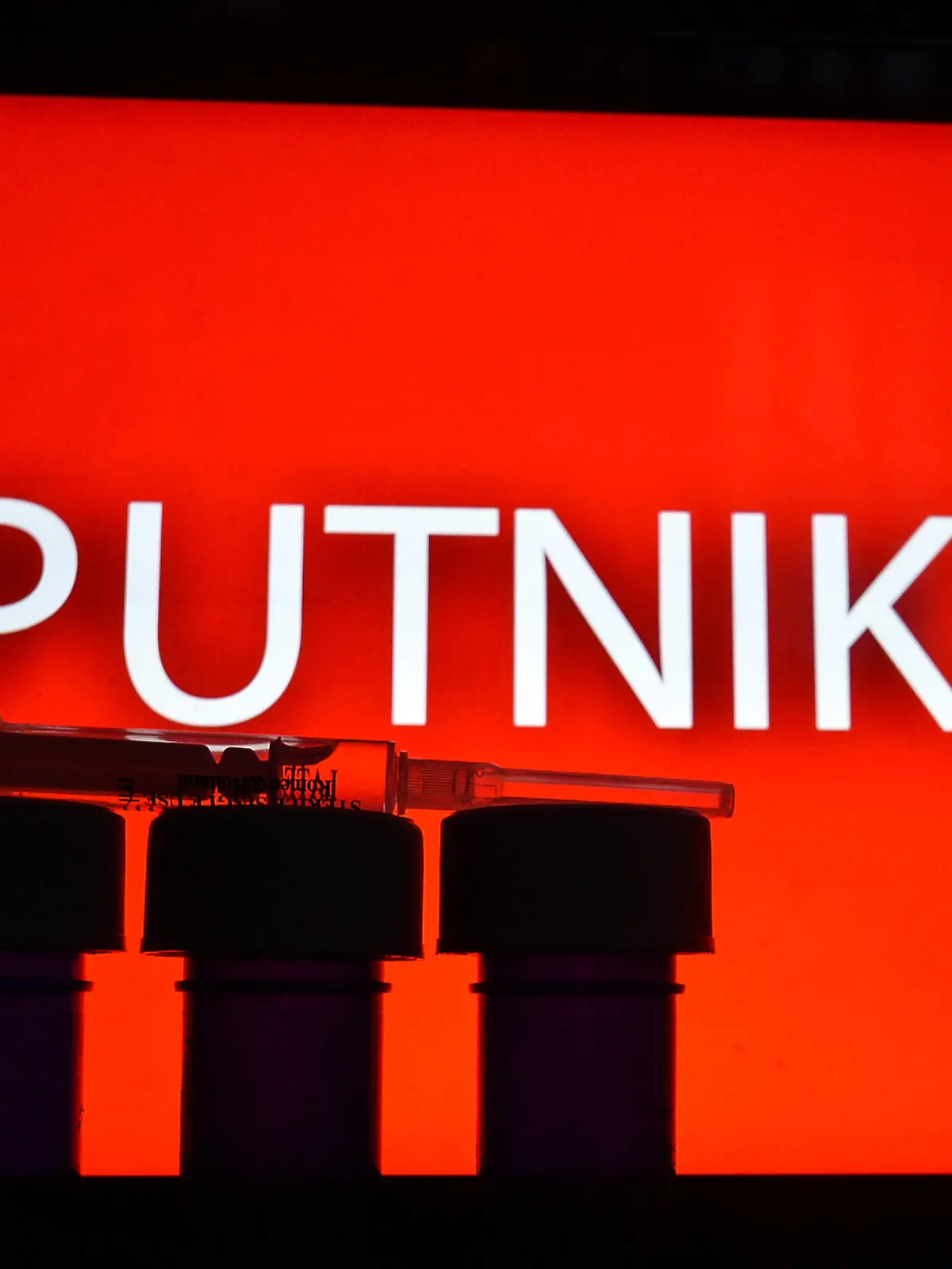  August 11, 2020, Krakow, Lesser Poland Voivodeship, Poland: In this photo illustration two medical syringes and Sputnik V inscription in the background. Krakow Poland - ZUMAs197 20200811_zab_s197_045 Copyright: xCezaryxKowalskix