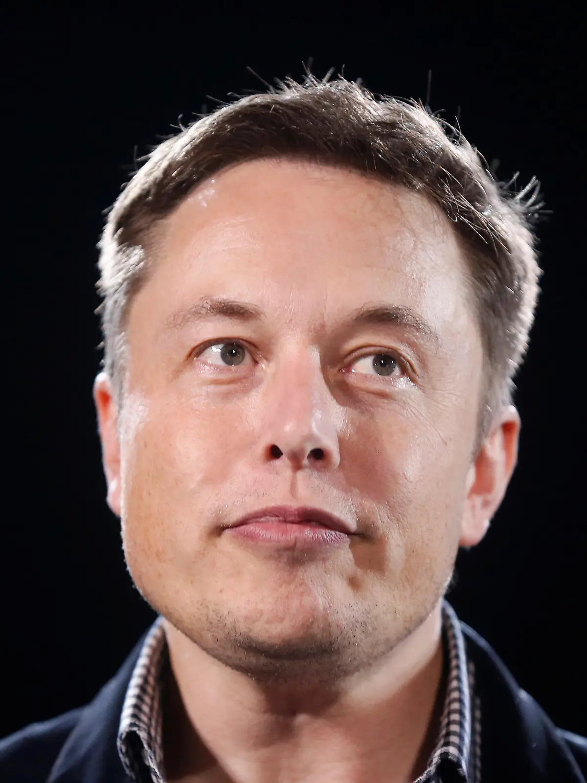 FILE PHOTO: Tesla Motors Inc CEO Elon Musk unveils a new all-wheel-drive version of the Model S car in Hawthorne, California October 9, 2014. REUTERS/Lucy Nicholson/File Photo