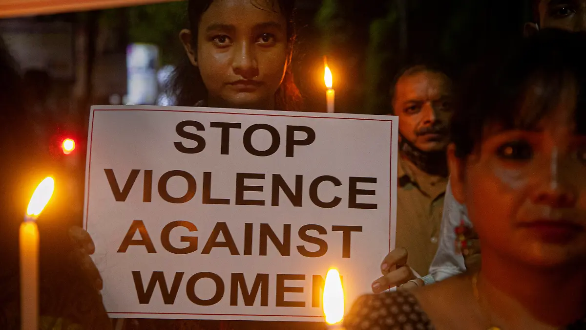 Indians hold placards protesting against the alleged gang rape and killing of a Dalit woman in Uttar Pradesh state, in Gauhati, India, Saturday, Oct. 10, 2020. Protestors have been demanding the dismissal of the government of a northern Indian state where the 19-year-old woman from the country's lowest caste was allegedly gang raped and later died in a hospital. Dalits, formerly known as "untouchables" and at the bottom of India's Hindu caste hierarchy, are victims of thousands of attacks each year. (AP Photo/Anupam Nath)