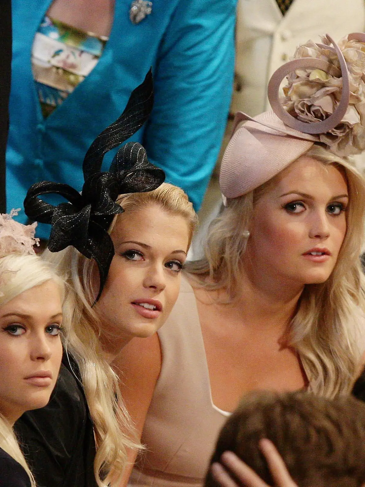 LONDON, ENGLAND - APRIL 29: Earl Spencer's daughter's (L-R) Lady Amelia, Lady Eliza and Lady Kitty sit together inside  Westminster Abbey ahead of the Royal Wedding of Prince William to Catherine Middleton at Westminster Abbey on April 29, 2011 in London, England. The marriage of the second in line to the British throne is to be led by the Archbishop of Canterbury and will be attended by 1900 guests, including foreign Royal family members and heads of state. Thousands of well-wishers from around the world have also flocked to London to witness the spectacle and pageantry of the Royal Wedding.  (Photo by Dave Thompson - WPA Pool/Getty Images)