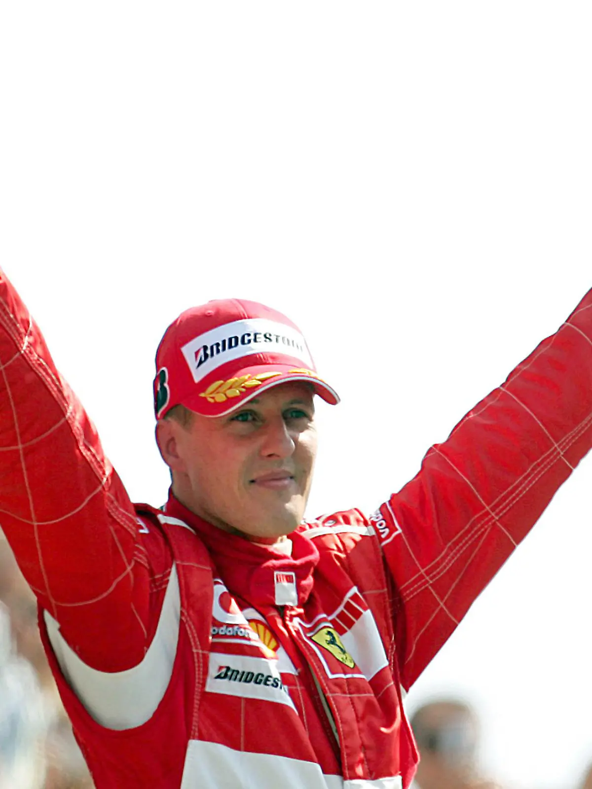 ARCHIV - 10.09.2006, Italien, Monza: Formel-1-Legende Michael Schumacher, damals Scuderia Ferrari, feiert seinen Sieg beim Großen Preis von Italien in Monza (Archivfoto vom 10.09.2006). Michael Schumacher wurde in seiner Karriere sieben Mal Weltmeister. (Zu dpa "NRW-Staatspreis für Michael Schumacher") Foto: Gero Breloer/dpa +++ dpa-Bildfunk +++