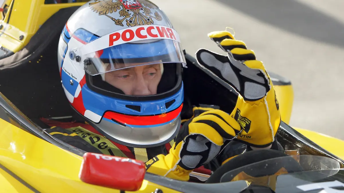 Russian Prime Minister Vladimir Putin prior to testing Renault F 1 race car on a track outside St. Petersburg, Russia, 07 November 2010. The head of government was driving the car for a few hours on a special track at 240 kilometers per hour. EPA/ALEXEY NIKOLSKY NOT FOR USE AFTER 07 DECEMBER 2010, NO SALES NO ARCHIVES