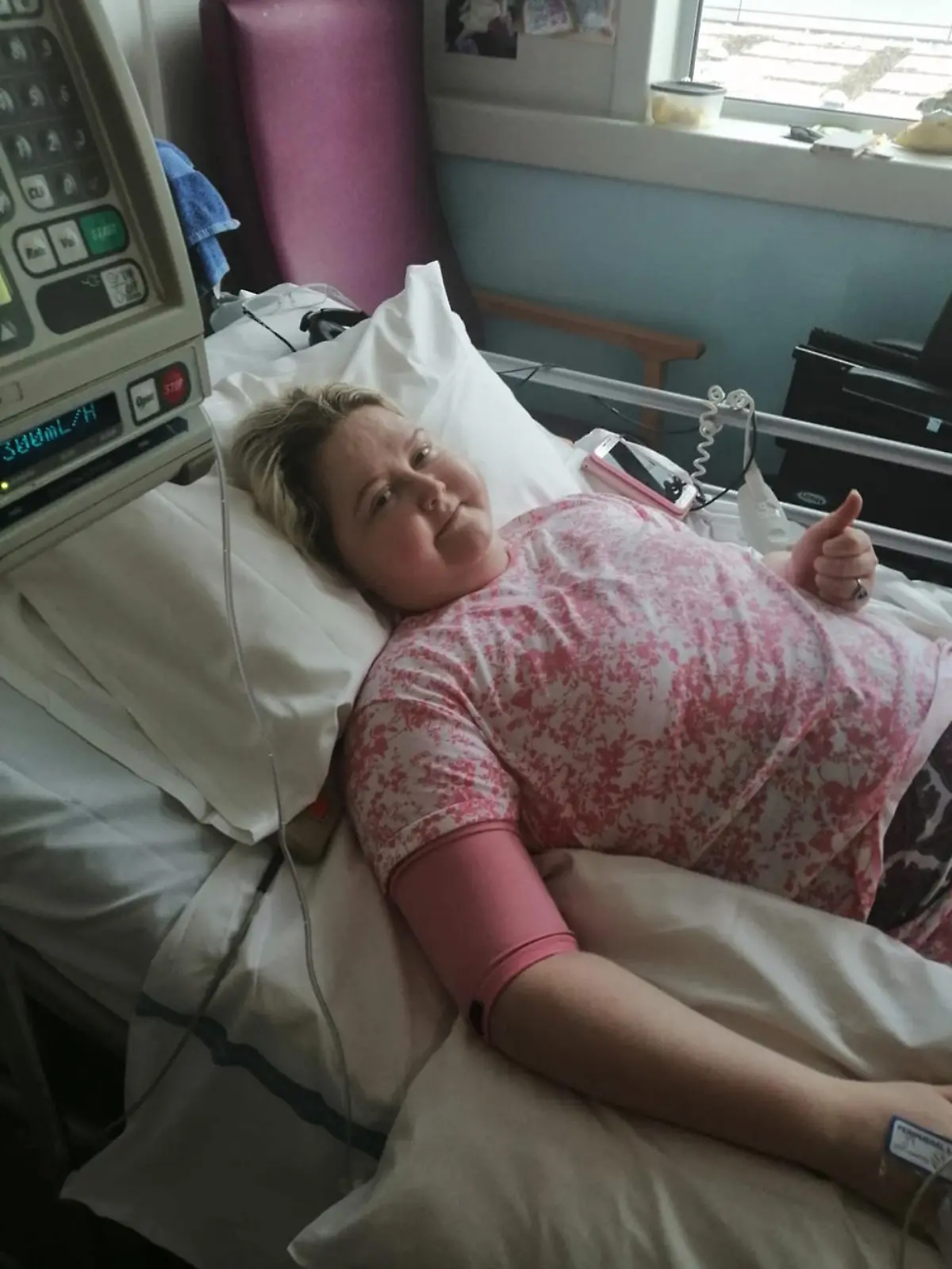 Frau in Krankenbett