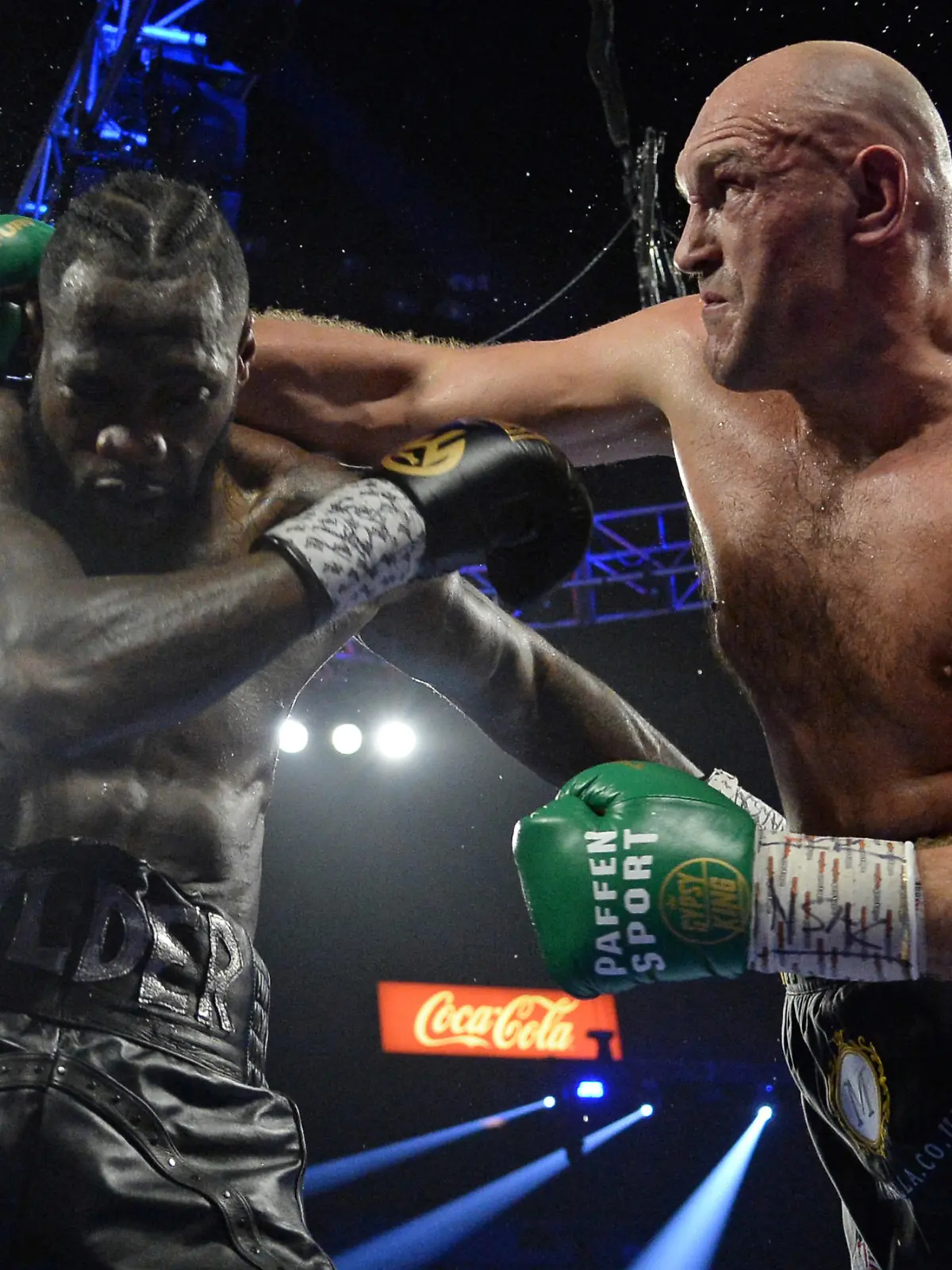FILE PHOTO: Feb 22, 2020; Las Vegas, Nevada, USA; Deontay Wilder and Tyson Fury box during their WBC heavyweight title bout at MGM Grand Garden Arena. Fury won via seventh round TKO. Mandatory Credit: Joe Camporeale-USA TODAY Sports/File Photo