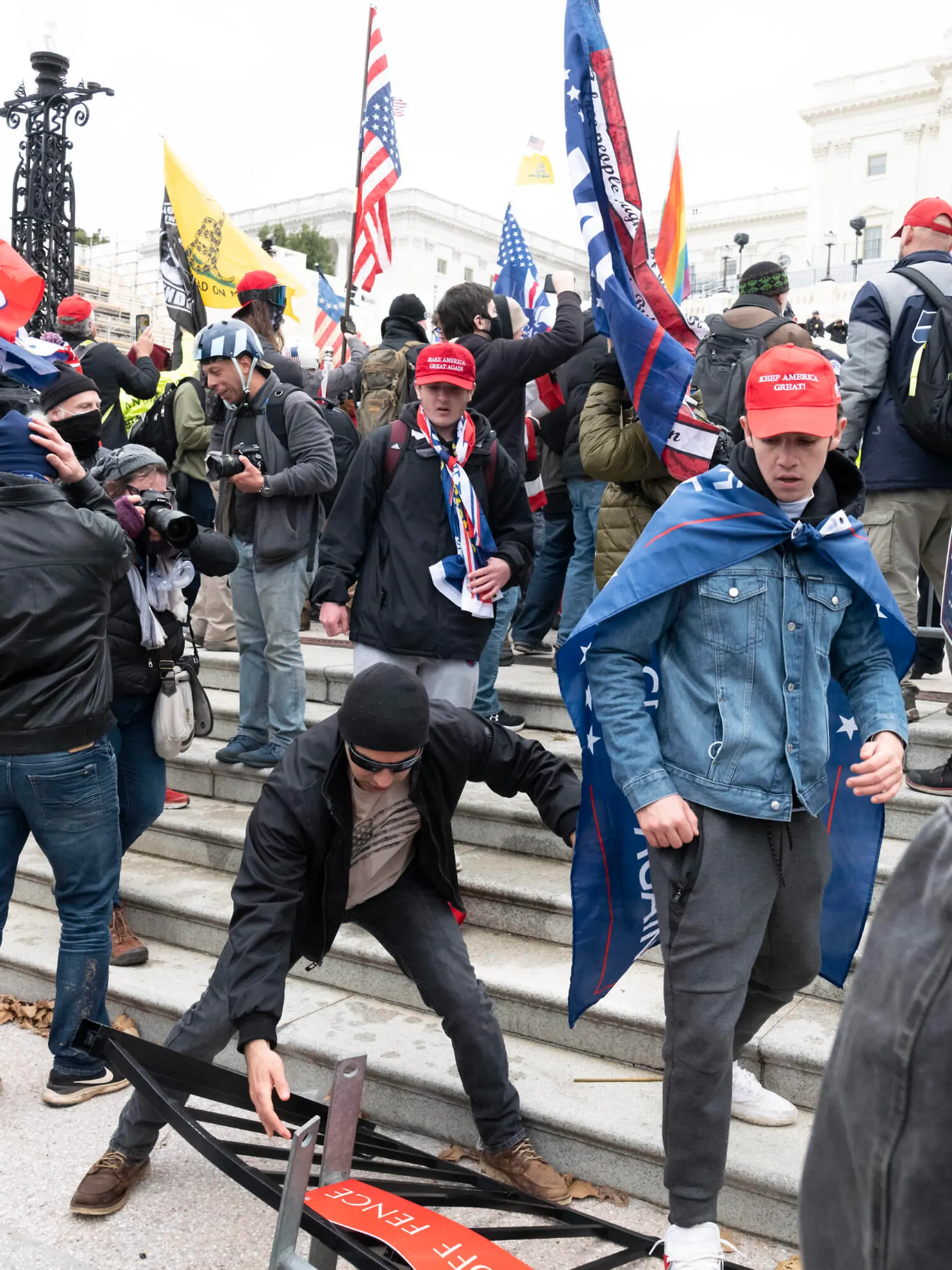  January 6, 2021, Washington, District of Columbia, USA: Trump supporters take over the steps of the Capitol on Wednesday, as the Congress works to certify the electoral college votes. Washington USA - ZUMAp140 20210106_zap_p140_015 Copyright: xBrianxBranchxPricex