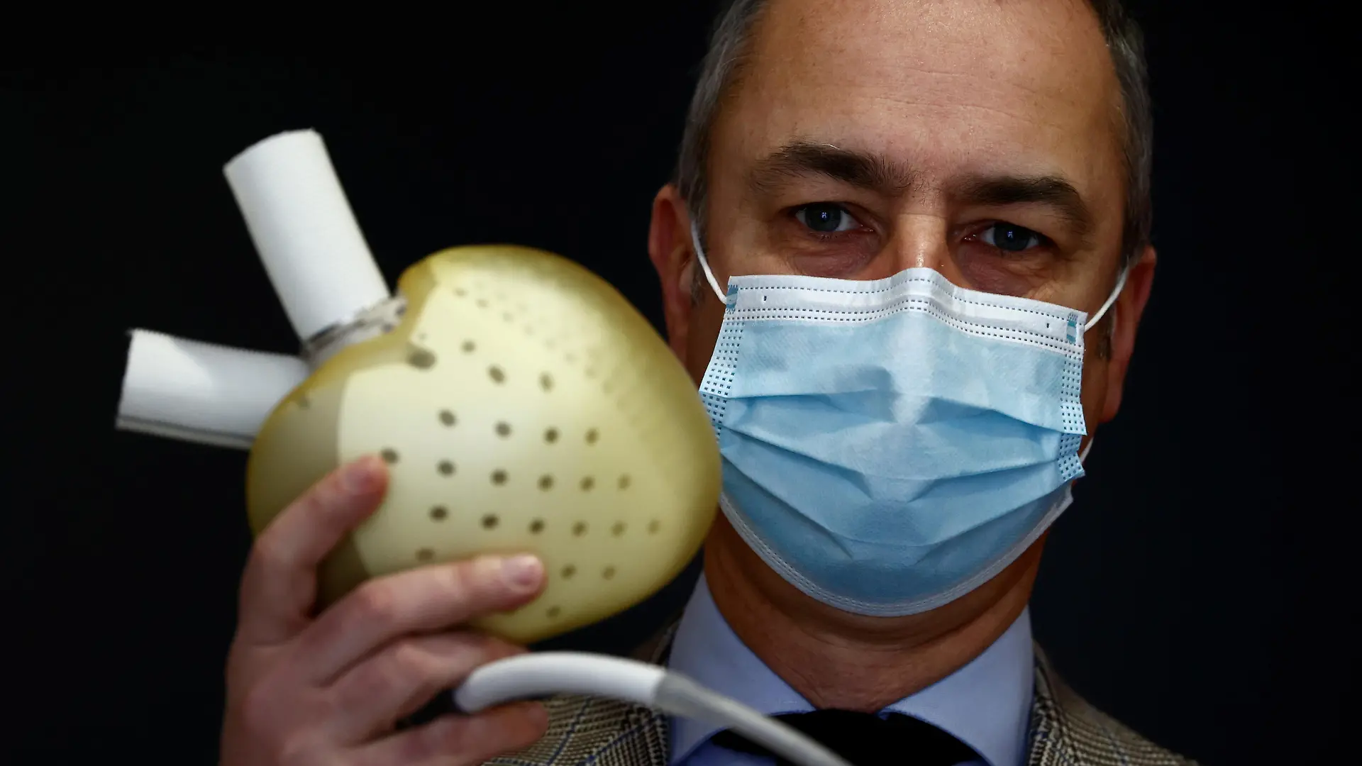 Chief Executive Officer of French artificial heart manufacturer Carmat, Stephane Piat, poses holding an artificial heart during an interview with Reuters in Velizy, near Paris, January 11, 2021. REUTERS/Christian Hartmann