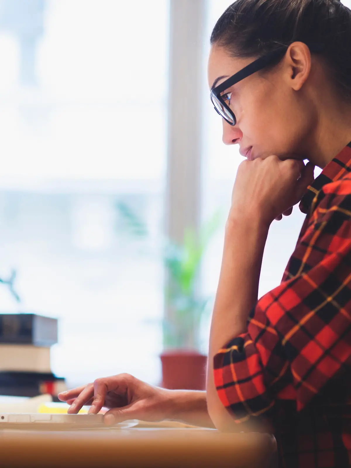 Young woman working on laptop