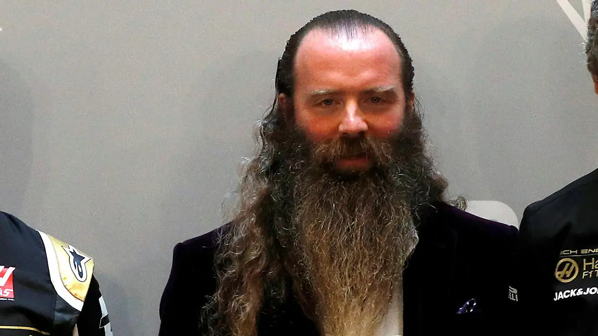 FILE PHOTO: Formula One F1 - Haas Formula One Team Livery Launch - Royal Automobile Club, London, Britain - February 7, 2019 Haas' Kevin Magnussen, Romain Grosjean, Rich Energy CEO William Storey and Haas Team Principal Guenther Steiner during the launch REUTERS/John Sibley/File Photo