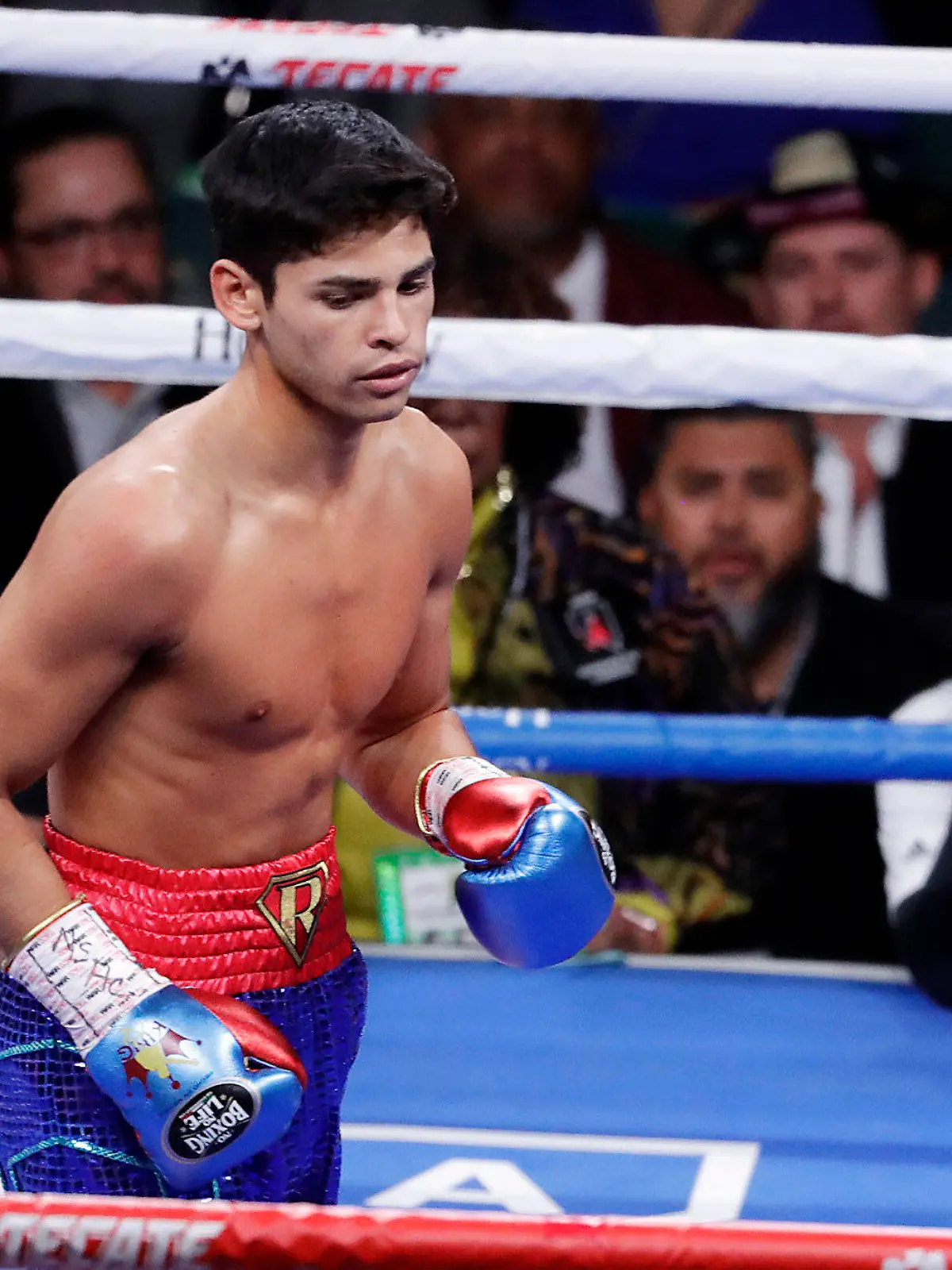 FILE - In this Nov. 2, 2019 file photo, Ryan Garcia, looks on after landing a punch to Romero Duno (not seen) during their lightweight boxing match in Las Vegas.   Garcia meets Britain’s Luke Campbell, a 2012 Olympic champion, in an interim WBC lightweight title fight. The bout was postponed a month and moved from California after Campbell tested positive for COVID-19.(AP Photo/Isaac Brekken, File)