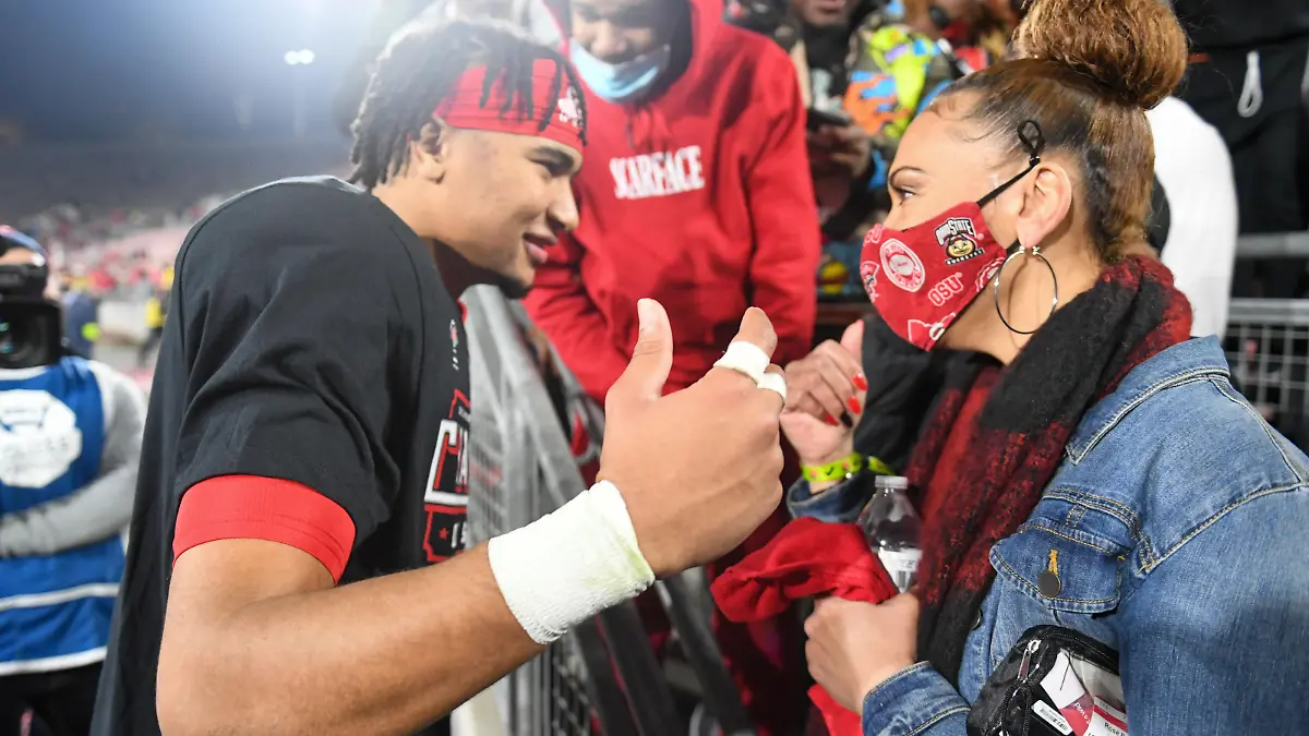 Ohio State Buckeyes quarterback C.J. Stroud (7) embraces his mother, Kim Stroud, after the Rose Bowl game against the Utah Utes, Saturday, Jan. 1, 2022, in Pasadena, Calif. Ohio State defeated Utah 48-45. (Dylan Stewart/Image of Sport) Photo via Newscom picture alliance