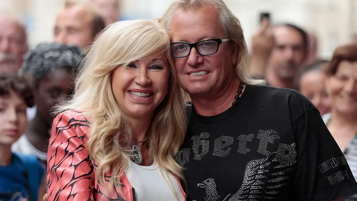 MUNICH, GERMANY - JULY 04: TV performer Carmen (L) and Robert Geiss pose during the 'Die Geissens' photocall at Karstadt warehouse on July 4, 2013 in Munich, Germany. (Photo by Johannes Simon/Getty Images)
