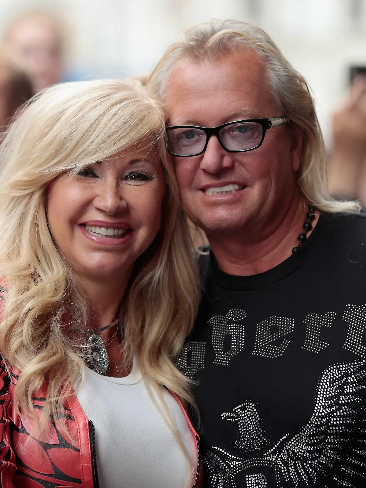 MUNICH, GERMANY - JULY 04:  TV performer Carmen (L) and Robert Geiss pose during the 'Die Geissens' photocall at Karstadt warehouse on July 4, 2013 in Munich, Germany.  (Photo by Johannes Simon/Getty Images)