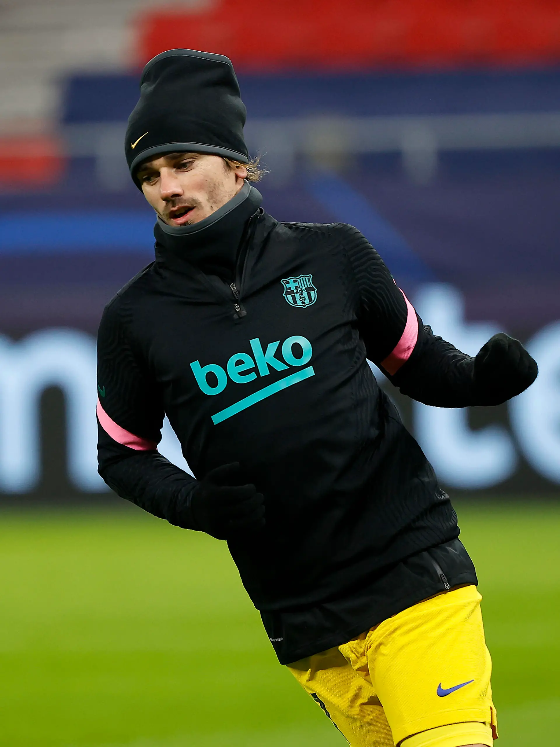 BUDAPEST, HUNGARY - DECEMBER 02: Antoine Griezmann of Barcelona warms up during the UEFA Champions League Group G stage match between Ferencvaros Budapest and FC Barcelona at Psukas Arena on December 02, 2020 in Budapest, Hungary. Sporting stadiums around Hungary remain under strict restrictions due to the Coronavirus Pandemic as Government social distancing laws prohibit fans inside venues resulting in games being played behind closed doors. (Photo by Laszlo Szirtesi/Getty Images)