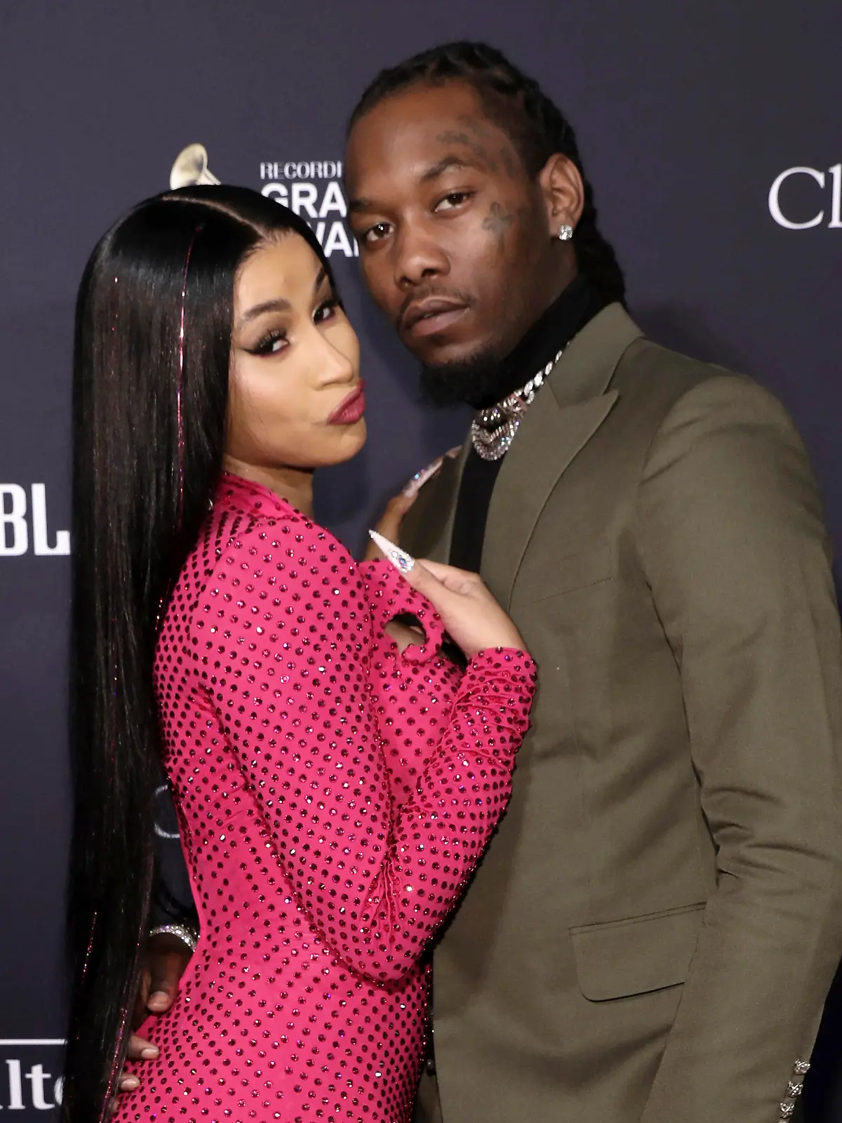 FILE - Cardi B, left, and Offset arrive at the Pre-Grammy Gala And Salute To Industry Icons in Beverly Hills, Calif. on  Jan. 25, 2020. Cardi B has filed for divorce from Offset, claiming her marriage was “irretrievably broken.” A Fulton County Courthouse filing states that she filed the divorce documents Tuesday in Atlanta. (Photo by Mark Von Holden/Invision/AP, File)