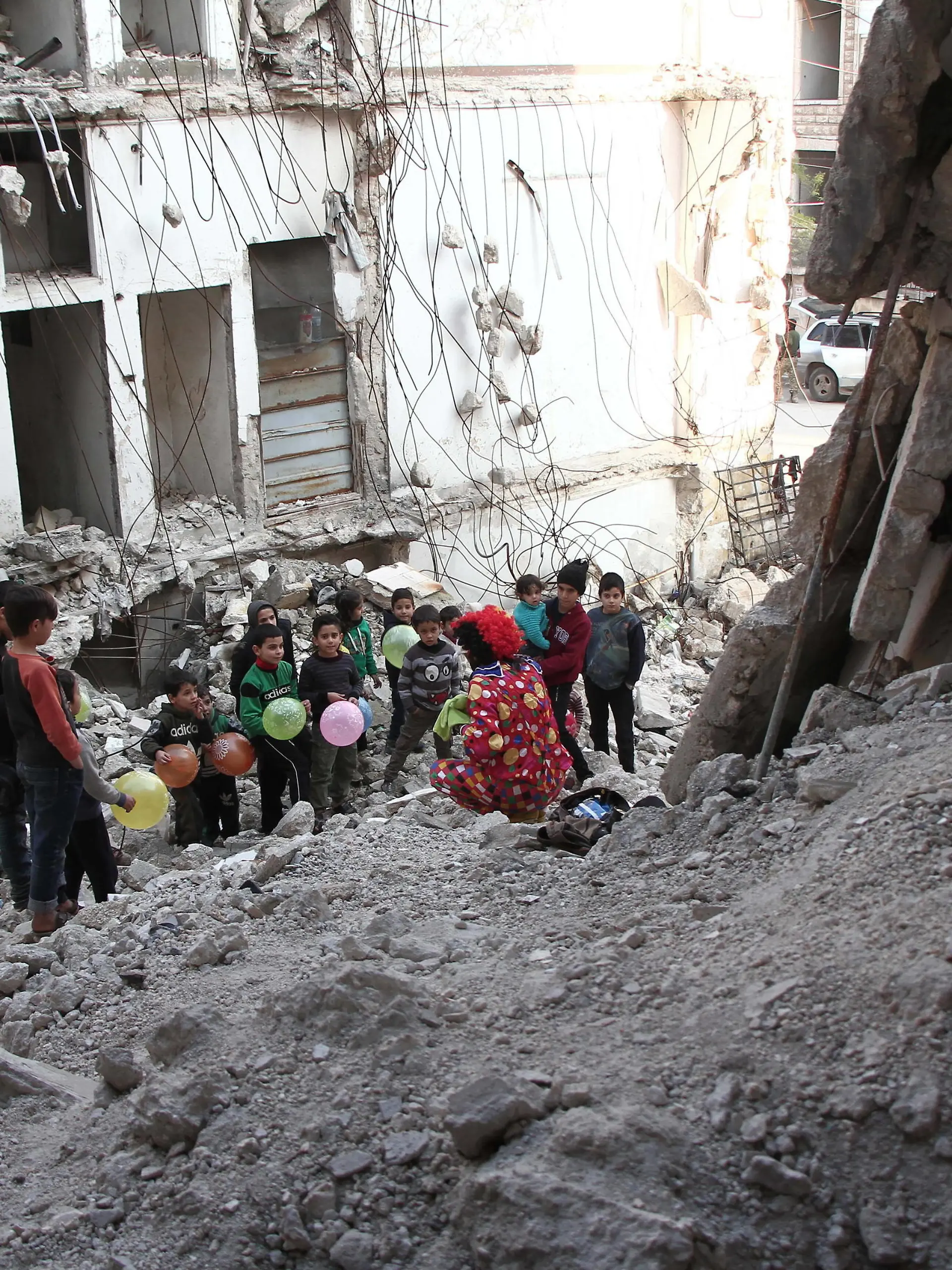  December 4, 2020, Idlib, Idlib Governorate, Syria: Majd Hamo, a Syrian clown in Idlib governorate northern Syria conducts a psychological support activity for children displaced from their cities in Syria as a result of bombing. Idlib Syria - ZUMAq100 20201204_zaa_q100_006 Copyright: xMahamadxKazmoozx