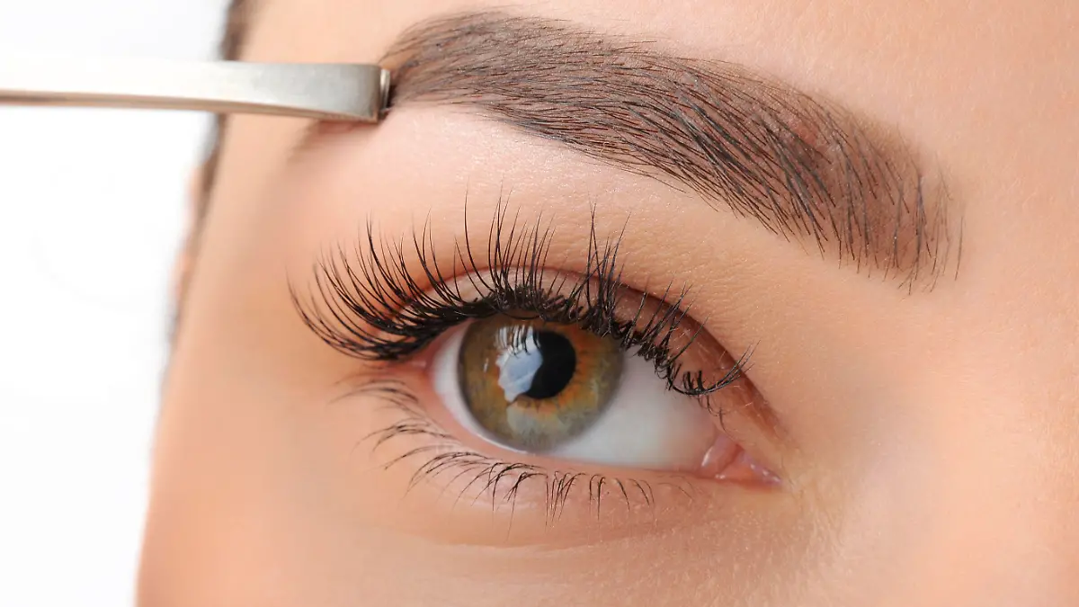 Make-up. Eyes. Eyelashes. Nice clean skin. Correction of eyebrows