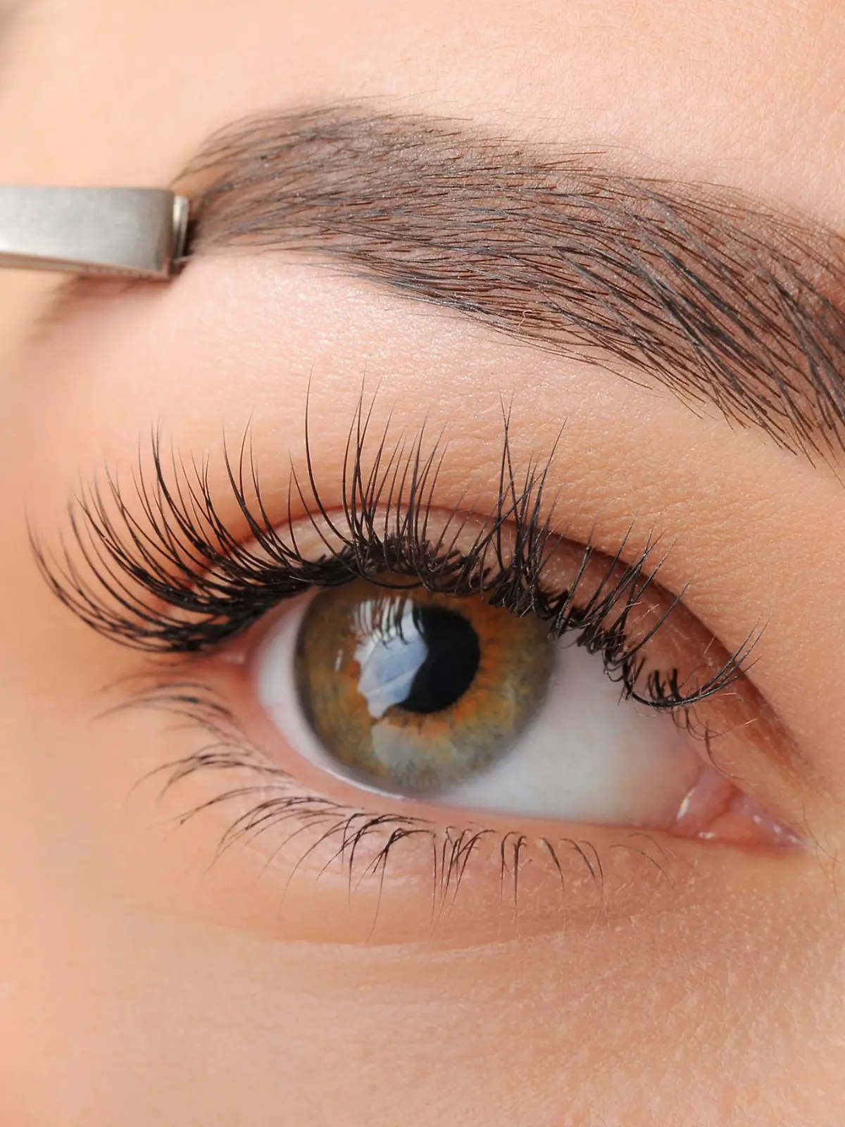 Make-up. Eyes. Eyelashes. Nice clean skin. Correction of eyebrows