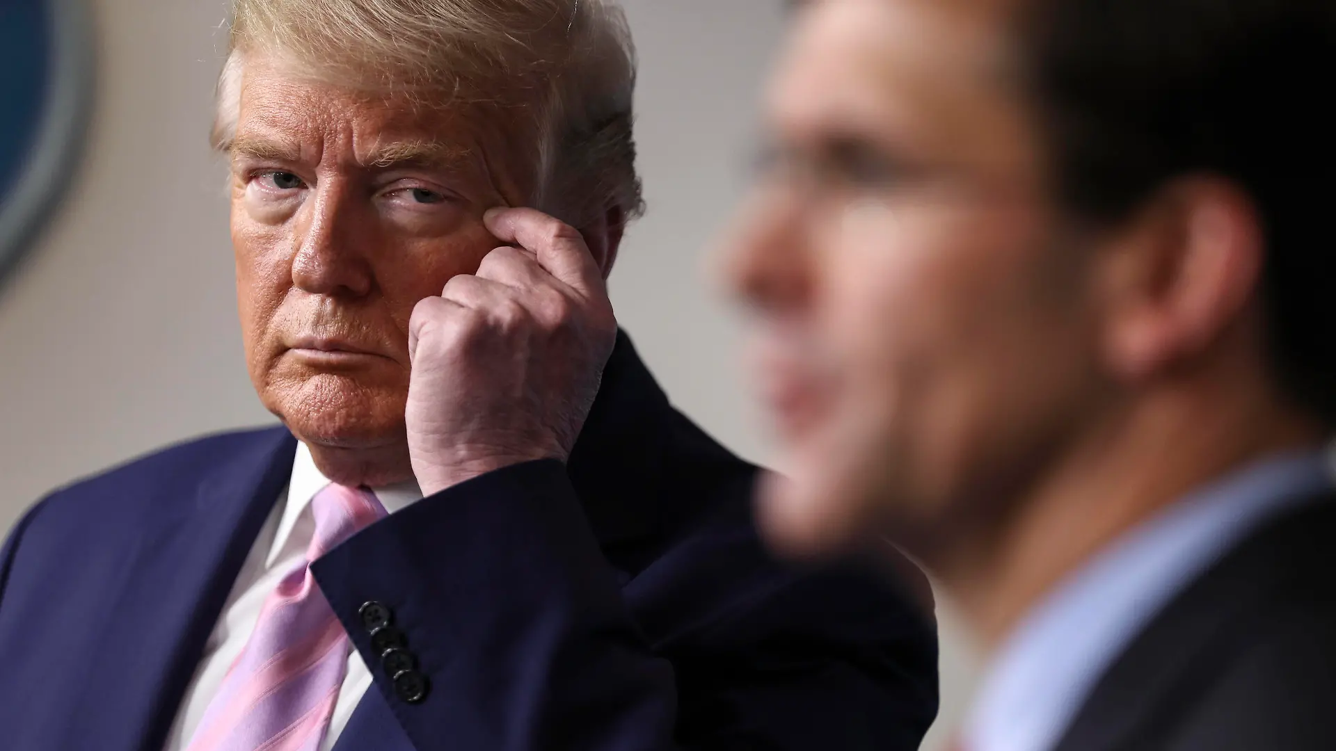 United States President Donald J. Trump touches his face as US Secretary of Defense Dr. Mark T. Esper speaks during the daily briefing on the novel coronavirus, COVID-19, in the Brady Press Briefing Room of the White House on April 1, 2020 in Washington, DC. PUBLICATIONxNOTxINxUSA Copyright: xCNPx/xMediaPunchx