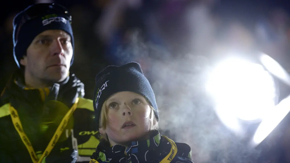 Young ski jumper Mico Ahonen follows the Ski Jumping Team Competition with his father Janne Ahonen at the Lahti Ski Games, FIS World Cup event, in Lahti, Finland, on March 9, 2013. LEHTIKUVA / Heikki Saukkomaa *** FINLAND OUT. NO THIRD PARTY SALES. ***