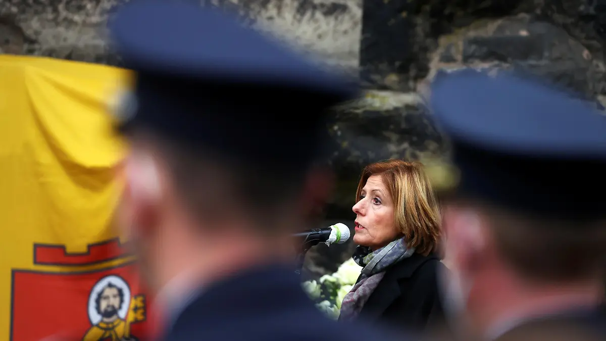Prime Minister at State of Rhineland-Palatinate Malu Dreyer speaks as people pay their respects near the site where a car crashed into pedestrians in Trier, Germany, December 2, 2020. REUTERS/Kai Pfaffenbach