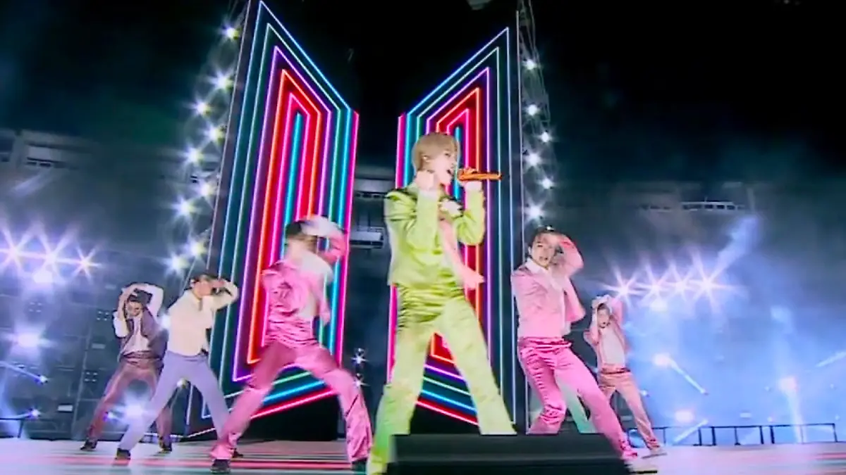 In this screen shot provided by ABC on Sunday, Nov. 22, 2020, BTS perform from Korea for the American Music Awards at the Microsoft Theater in Los Angeles. (ABC via AP)