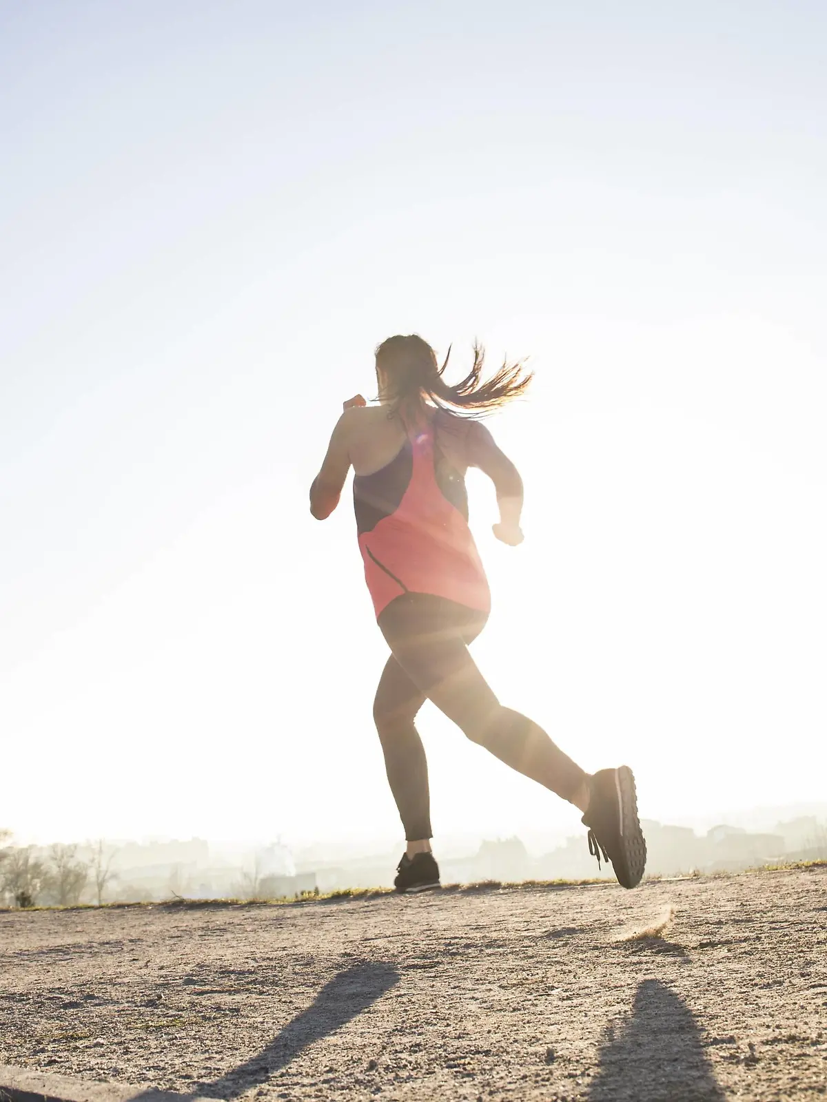 Young woman running in sunlight model released Symbolfoto PUBLICATIONxINxGERxSUIxAUTxHUNxONLY ABZF01843Young Woman RUNNING in Sunlight Model released Symbolic image PUBLICATIONxINxGERxSUIxAUTxHUNxONLY ABZF01843  
