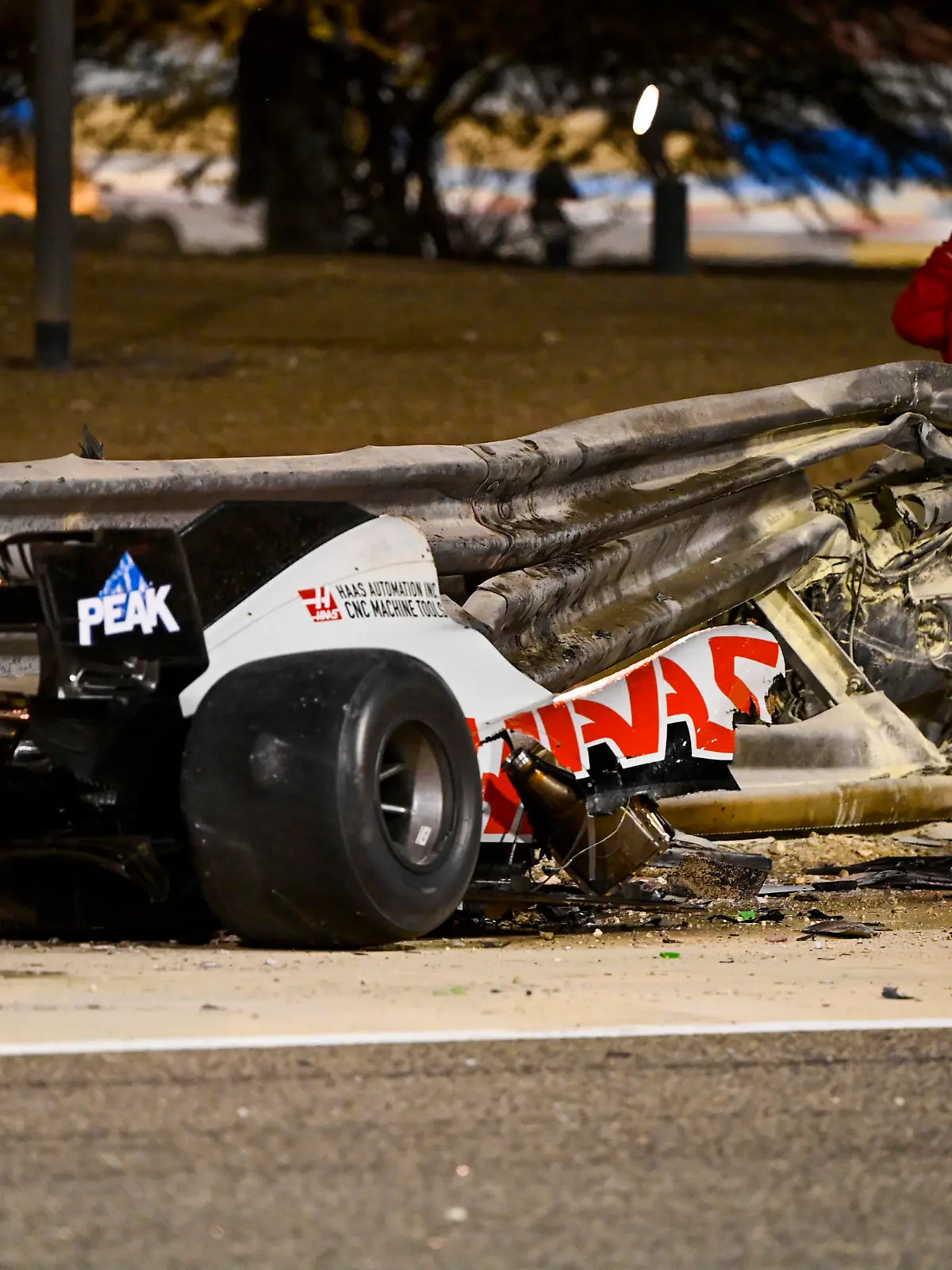  2020 Bahrain GP BAHRAIN INTERNATIONAL CIRCUIT, BAHRAIN - NOVEMBER 29: The wreckage of the car of Romain Grosjean, Haas VF-20, after his huge crash on the opening lap during the Bahrain GP at Bahrain International Circuit on Sunday November 29, 2020 in Sakhir, Bahrain. Photo by Mark Sutton / Sutton Images Images PUBLICATIONxINxGERxSUIxAUTxHUNxONLY GP2015_152014_MS21195