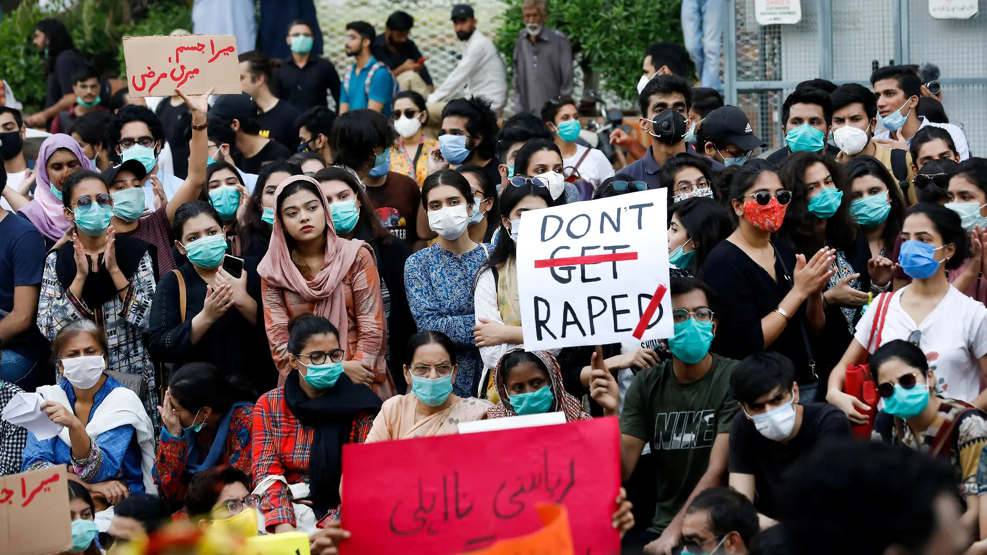 FILE PHOTO: People carry signs against a gang rape that occurred along a highway and to condemn violence against women and girls, during a protest in Karachi, Pakistan September 12, 2020. REUTERS/Akhtar Soomro/File Photo