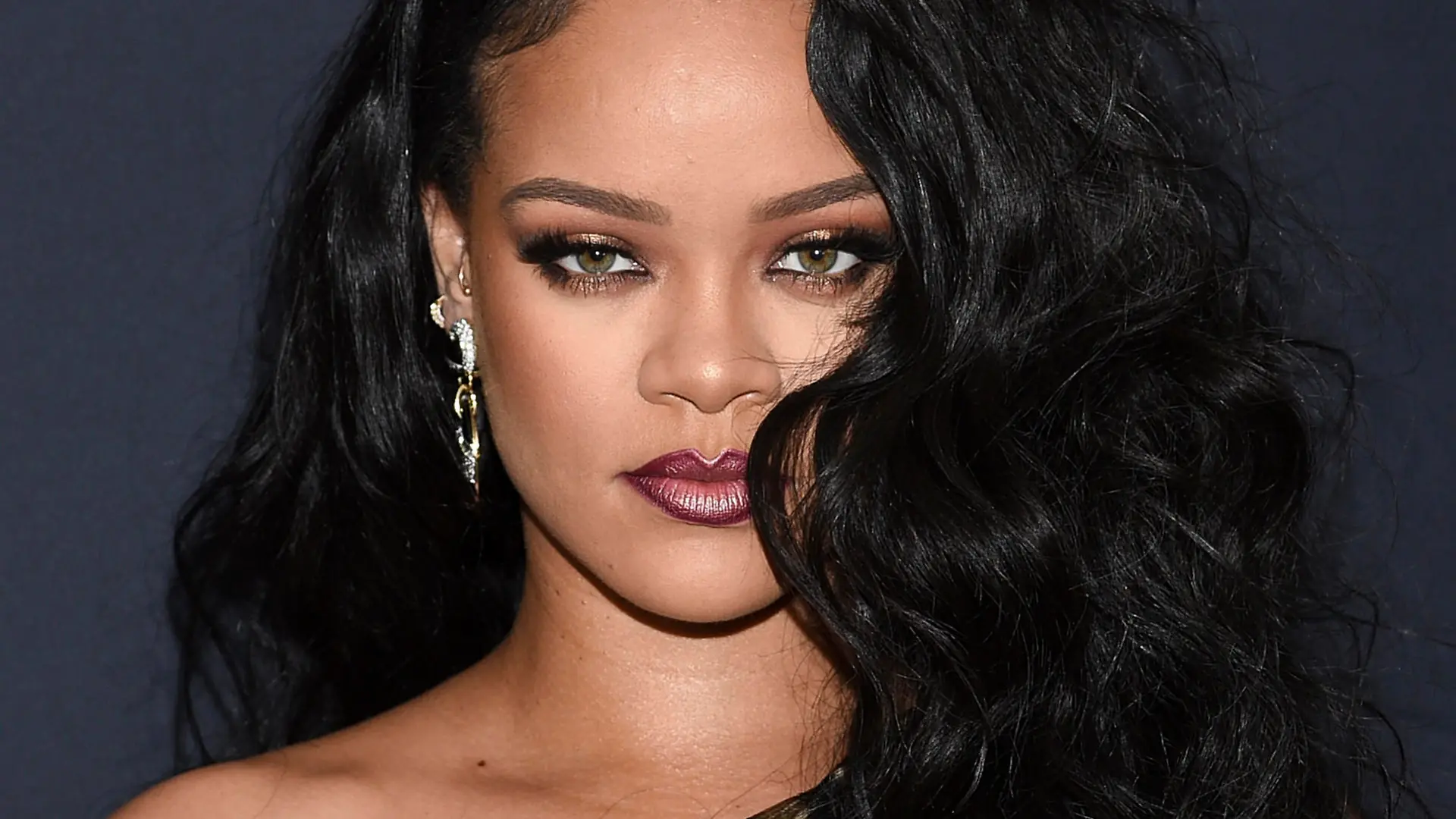FILE - Singer and fashion designer Rihanna attends the "Rihanna" book launch event in New York on Oct. 11, 2019. It's been four years since Rihanna released an album but the singer is working hard on recording new music. The pop star, 32, told The Associated Press for her new album she's already held “tons of writing camps" — where songwriters are put into groups to create original tracks for artists. (Photo by Evan Agostini/Invision/AP, File)