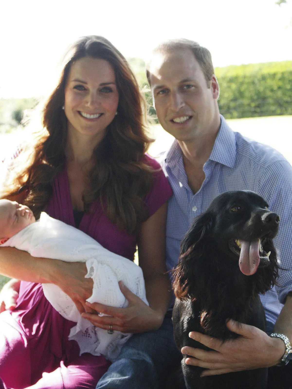 Birth of Prince George of Cambridge.  Copyright of TRH The Duke and Duchess of Cambridge 2013.
EDITORIAL USE ONLY. NO COMMERCIAL USE (including any use in merchandising, advertising or any other non-editorial use). This photograph is provided to you strictly on condition that you will make no charge for the supply, release or publication of it and that these conditions and restrictions will apply (and that you will pass these on) to any organisation to whom you supply it. All other requests for use should be directed to the Press Office at Kensington Palace in writing. Handout photo taken by Michael Middleton, the Duchess's father in early August and supplied by Kensington Palace of the Duke and Duchess of Cambridge as they sit with their son Prince George in the garden of the Middleton family home in Bucklebury, Berkshire surrounded by Tilly the retriever (a Middleton family pet), and Lupo, the couple's cocker spaniel.  Issue date: Tuesday August 20, 2013. See PA story ROYAL Baby. Photo credit should read: Michael Middleton/PA Wire URN:17363699 |
