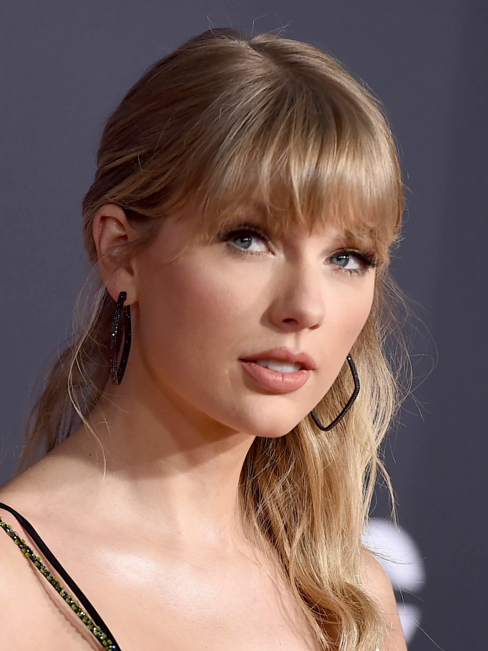 FILE - This Nov. 24, 2019 file photo shows Taylor Swift at the American Music Awards in Los Angeles. Swift was named songwriter of the year at the second annual Apple Music Awards. (Photo by Jordan Strauss/Invision/AP, File)