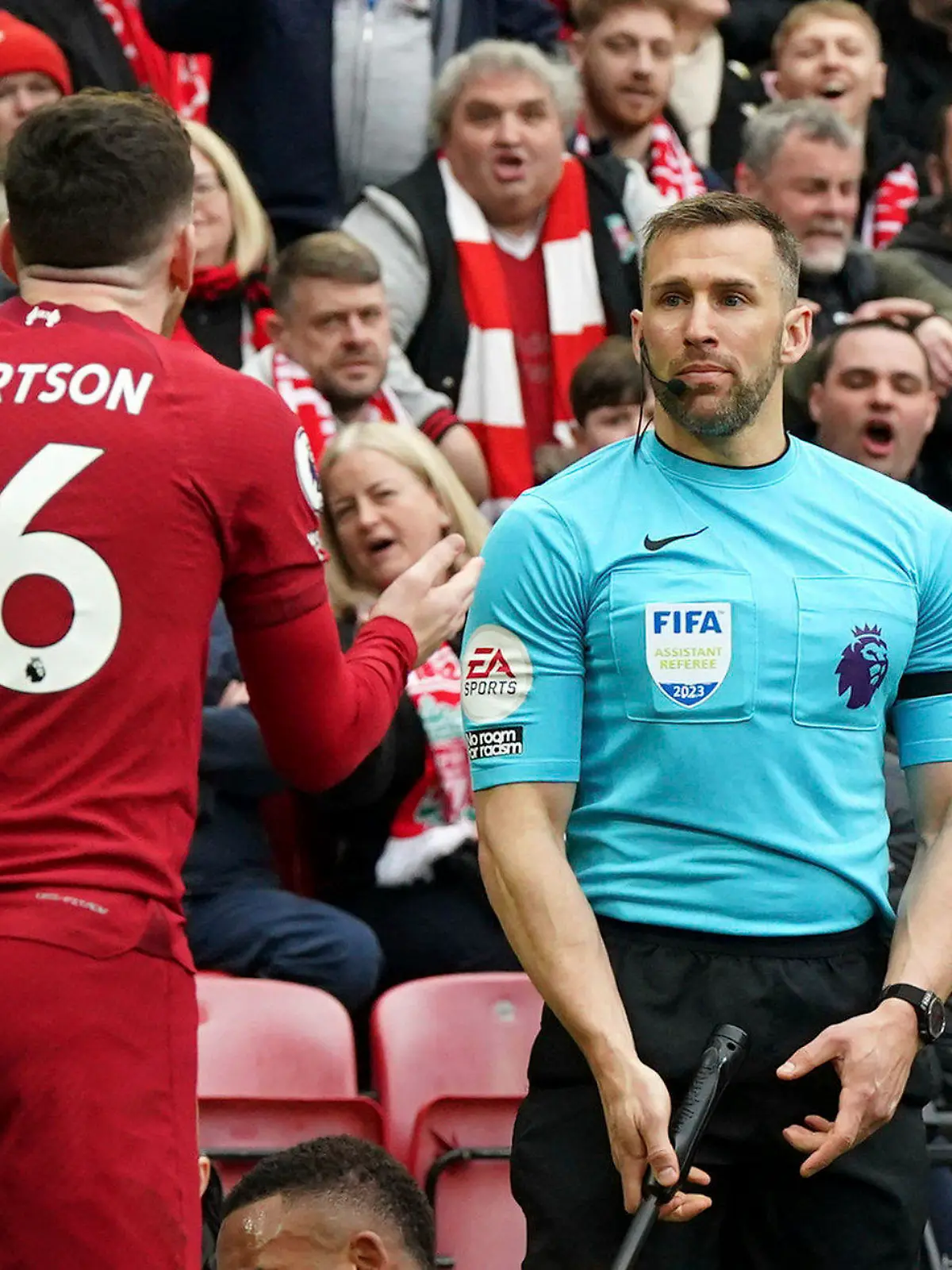 Liverpool's Andrew Robertson appeals to assistant referee Constantine Hatzidakis during the Premier League match between Liverpool and Arsenal at Anfield, Liverpool, Britain, Sunday April 9, 2023. (Nick Potts/PA via AP)
