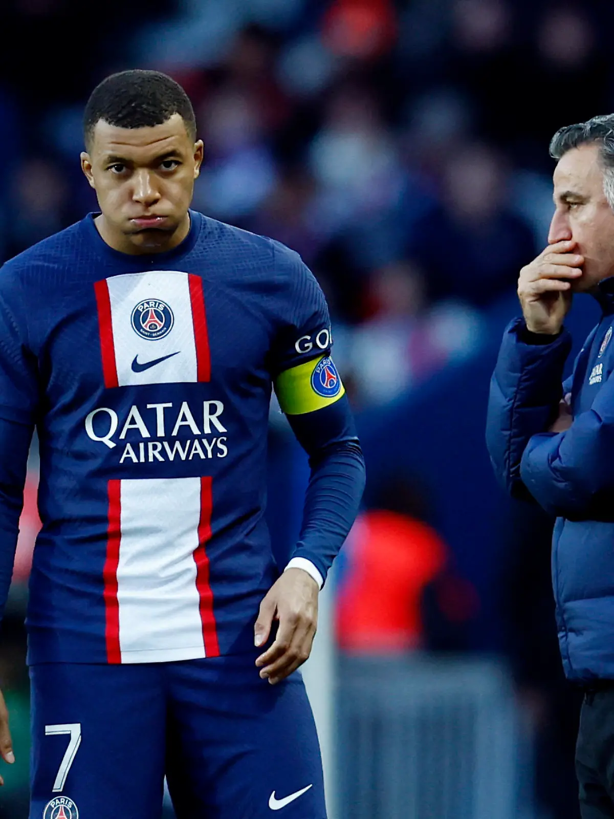 Soccer Football - Ligue 1 - Paris St Germain v Stade Rennes - Parc des Princes, Paris, France - March 19, 2023 Paris St Germain's Kylian Mbappe reacts as coach Christophe Galtier looks on REUTERS/Gonzalo Fuentes