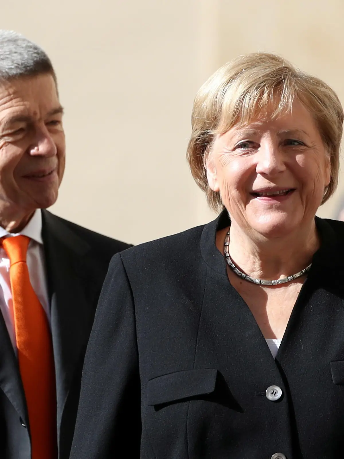 FILE PHOTO: German Chancellor Angela Merkel and her husband Joachim Sauer arrive ahead of a meeting with Pope Francis at the Vatican October 7, 2021. REUTERS/Yara Nardi/File Photo