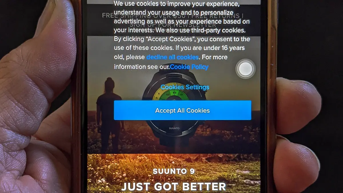 This photo illustration shows an iPhone screen with Suunto's Cookie Policy reflected in Los Angeles Friday, Oct. 2, 2020. Proposition 24 on California's November ballot seeks to expand California's consumer privacy law by tripling penalties for companies that break laws regarding the collection and sale of children's private information. It would also create a state agency to enforce consumer privacy protections. (AP Photo/Damian Dovarganes)
