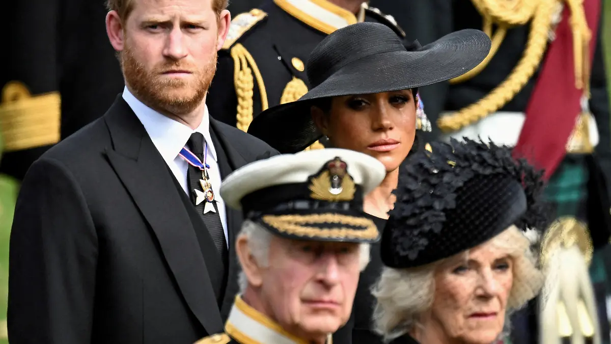 FILE PHOTO: Britain's Meghan, Duchess of Sussex, cries as she, Prince Harry, Duke of Sussex, Queen Camilla and King Charles attend the state funeral and burial of Britain's Queen Elizabeth, in London, Britain, September 19, 2022.       REUTERS/Toby Melville/File Photo