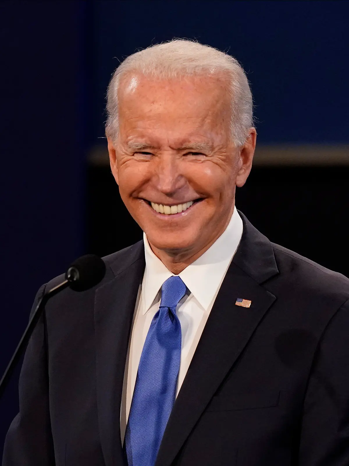 Democratic presidential candidate former Vice President Joe Biden smiling during the second and final presidential debate Thursday, Oct. 22, 2020, at Belmont University in Nashville, Tenn. (AP Photo/Patrick Semansky)