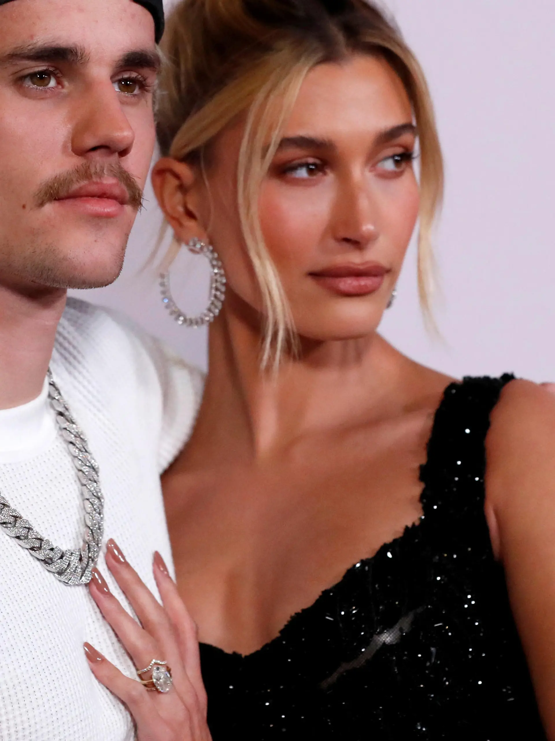 FILE PHOTO: Singer Justin Bieber and his wife Hailey Baldwin pose at the premiere for the documentary television series "Justin Bieber: Seasons" in Los Angeles, California, U.S., January 27, 2020. REUTERS/Mario Anzuoni/File Photo