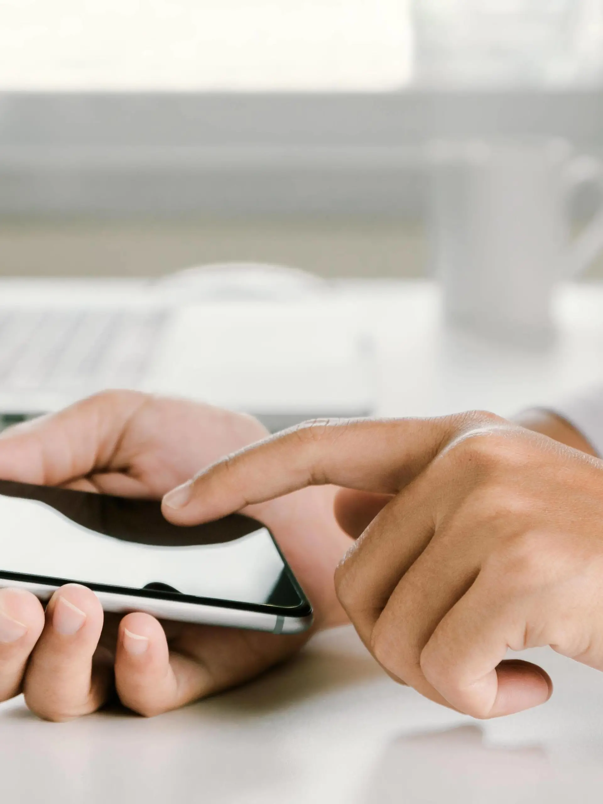 closeup woman hand using phone on workspace in office PUBLICATIONxINxGERxSUIxAUTxONLY Copyright: xblackzheepx Panthermedia19131903  
