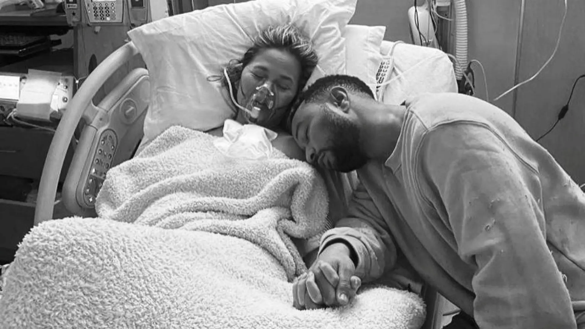 Chrissy Teigen and John Legend are seen inside the hospital after pregnancy complications, in this undated picture obtained from social media. Courtesy of Instagram CHRISSY TEIGEN/Social Media via REUTERS ATTENTION EDITORS - THIS IMAGE HAS BEEN SUPPLIED BY A THIRD PARTY. MANDATORY CREDIT. NO RESALES. NO ARCHIVES.