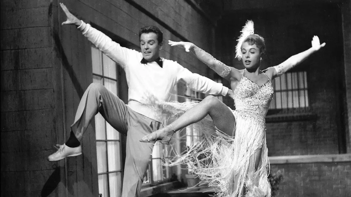 1953 - Give a Girl a Break - Movie Set PICTURED: MARGE CHAMPION as Madelyn Corlane and GOWER CHAMPION as Ted Sturgis. RELEASE DATE: December 3, 1953. MOVIE TITLE: Give a Girl a Break. STUDIO: Metro-Goldwyn-Mayer MGM. PLOT: The star of an upcoming Broadway production, Janet Hallson, walks out during rehersals. The producers of the show, Ted Sturgis, Leo Belney and Bob Dowdy begin to search a replacement. After a quick audition, each favors someone else: Madelyn Corlane, Joanna Moss, Suzie Doolittle. The rest of the movie tells in a series of musical and dance scenes how they finally pick. ACHTUNG NUTZUNG NUR BEI FILMTITEL-NENNUNG PUBLICATIONxINxGERxONLY 19531203_brt_g90_096.jpg