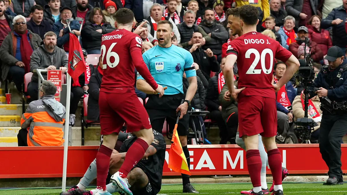 Liverpool v Arsenal - Premier League - Anfield Liverpool s Andrew Robertson appeals to assistant referee Constantine Hatzidakis during the Premier League match at Anfield, Liverpool. Picture date: Sunday April 9, 2023. EDITORIAL USE ONLY No use with unauthorised audio, video, data, fixture lists, club/league logos or live services. Online in-match use limited to 120 images, no video emulation. No use in betting, games or single club/league/player publications. PUBLICATIONxNOTxINxUKxIRL Copyright: xNickxPottsx 71693775