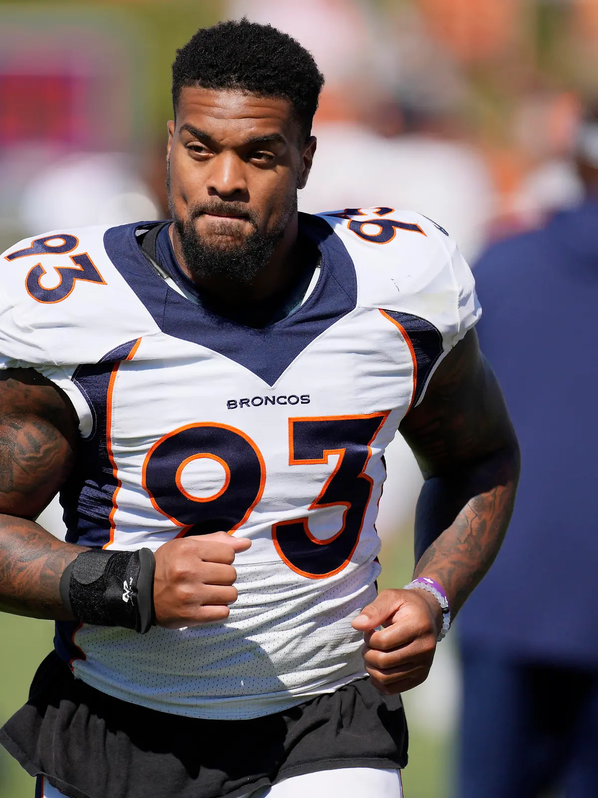 Denver Broncos defensive end Dre'Mont Jones takes part in drills during the NFL football team's training camp Tuesday, Aug. 2, 2022, at the Broncos' headquarters in Centennial, Colo. (AP Photo/David Zalubowski)