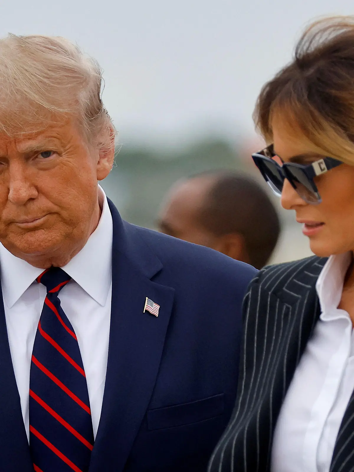 FILE PHOTO: President Donald Trump, who played down the threat of the coronavirus pandemic for months, said October 2 that he and his wife Melania had tested positive for COVID-19 and were going into quarantine, upending the race for the White House. REUTERS/Carlos Barria/File Photo