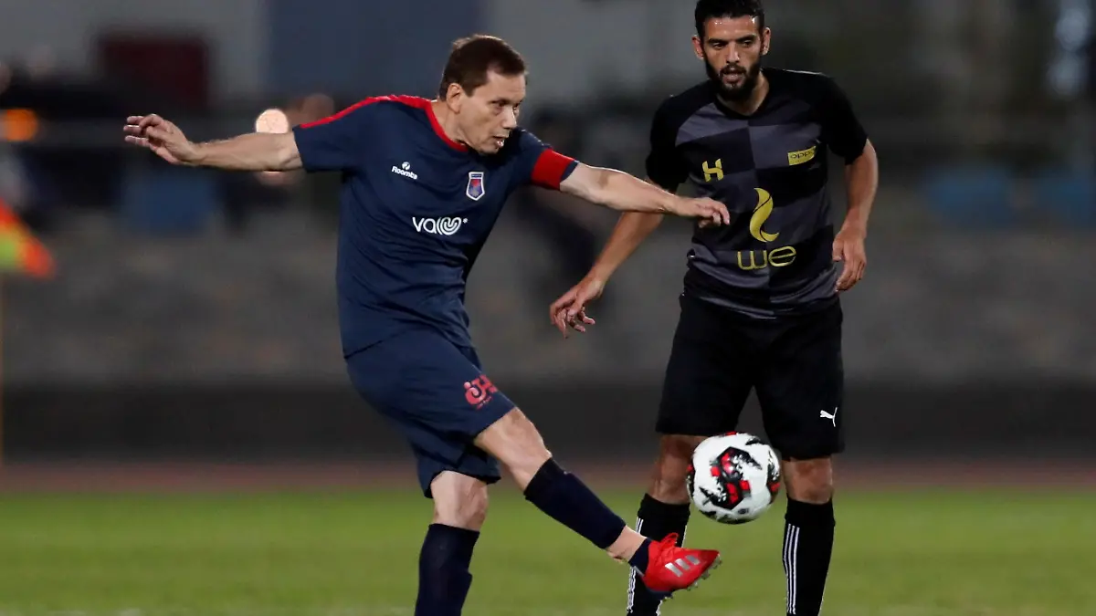 Ezzeldin Bahader, a 74-years-old Egyptian football player of 6th October Club is seen in action during a soccer match against El Ayat Sports Club of Egypt's third division league at the Olympic Stadium in the Cairo suburb of Maadi, Egypt October 17, 2020. Picture taken October 17, 2020. REUTERS/Amr Abdallah Dalsh   REFILE - CORRECTING AGE